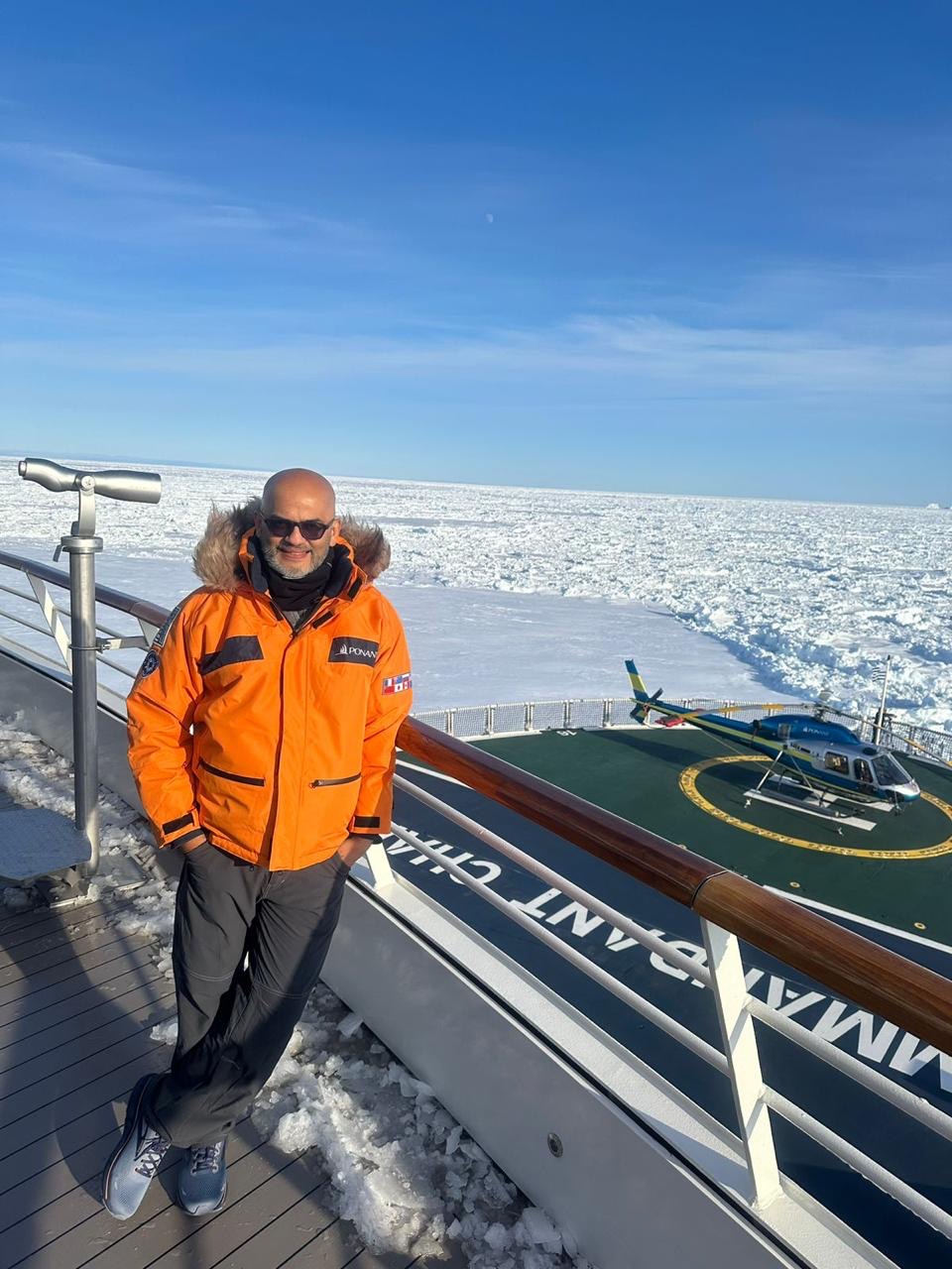 Mr Subhash standing on the cruise deck