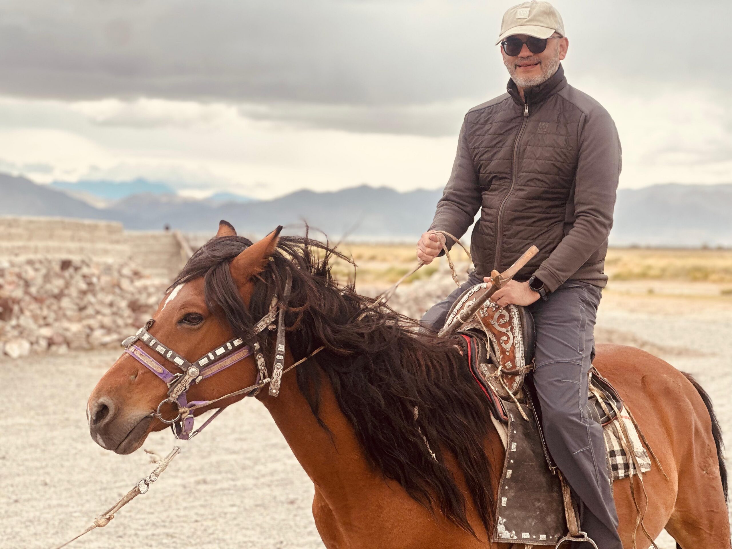 Subhash Motwani on horse back in Mongolia